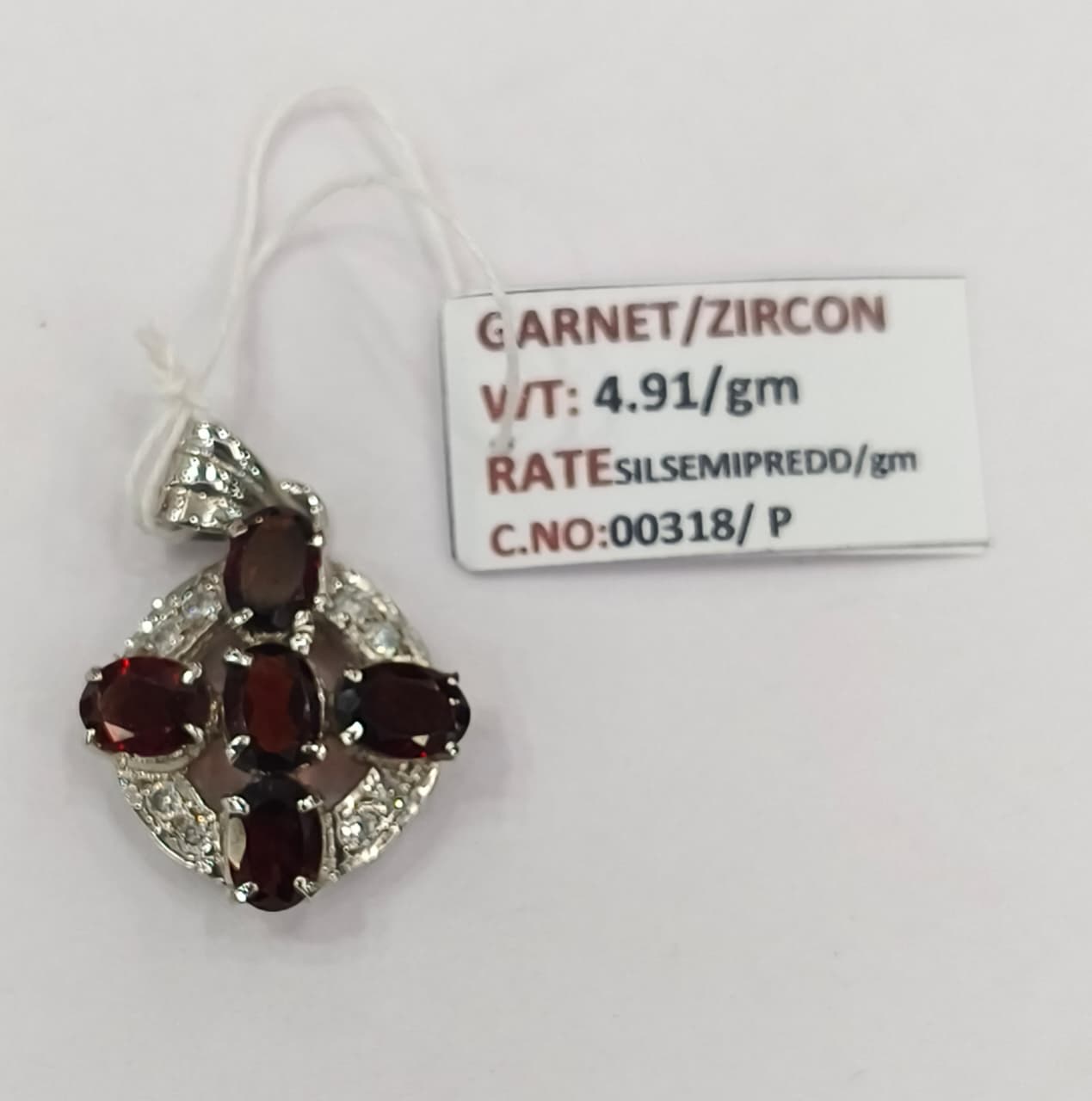 4.91/GM GARNET / ZIRCON (1650)