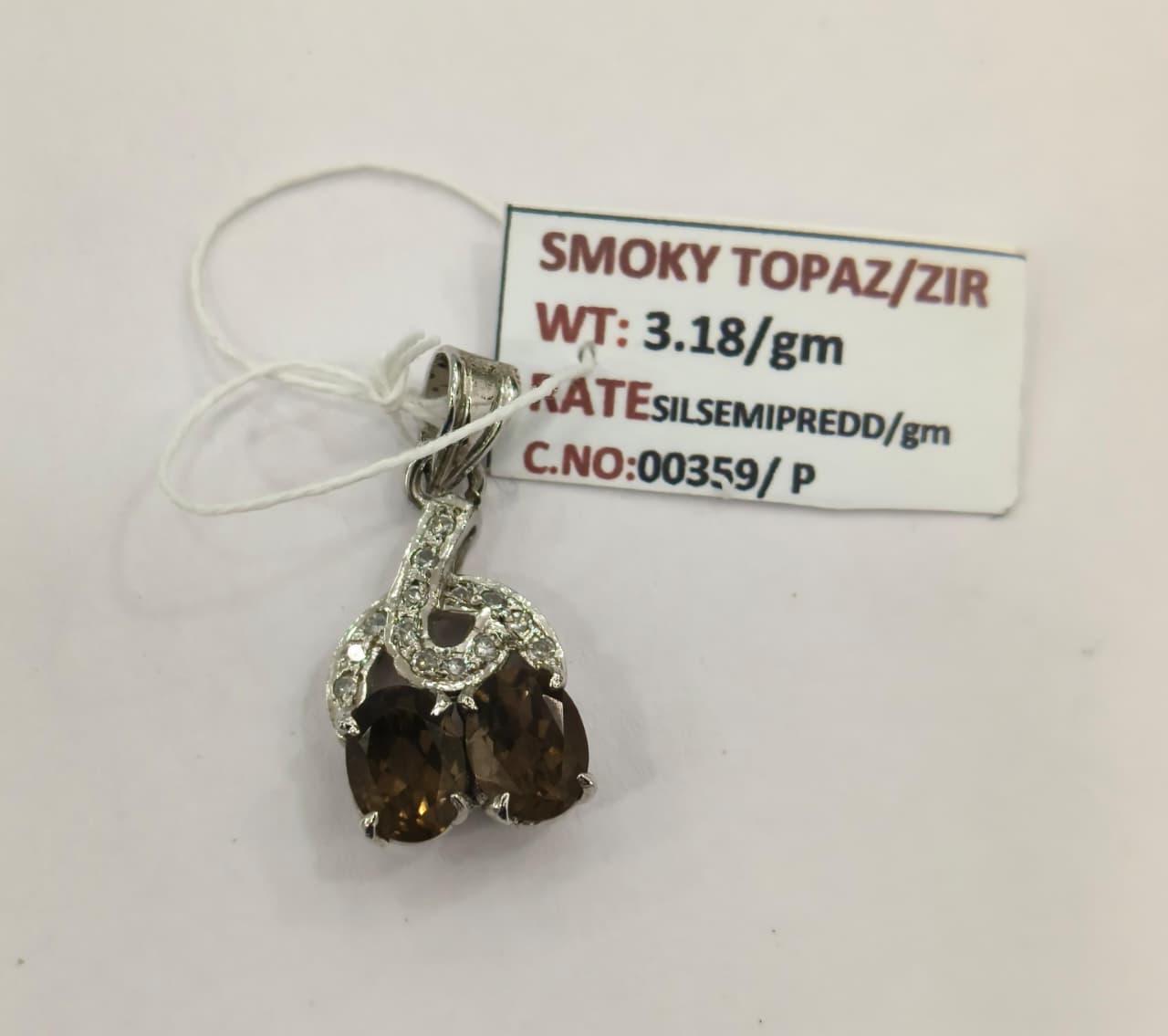 3.18/GM SMOKY TOPAZ / ZIRCON (1650)
