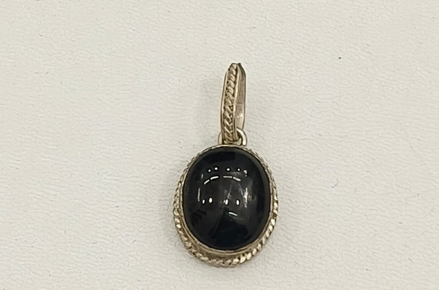 10.50/GM BLACK STAR SILVER PENDANT (525.00)