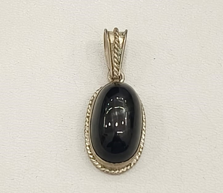 16.60/GM BLACK STAR SILVER PENDANT (525.00)