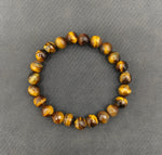 Load image into Gallery viewer, TIGER EYE FACETED BRACELET