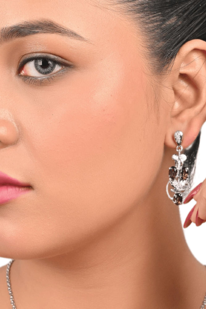 24.30/GM SMOKY TOPAZ/ZIRCON (1650)