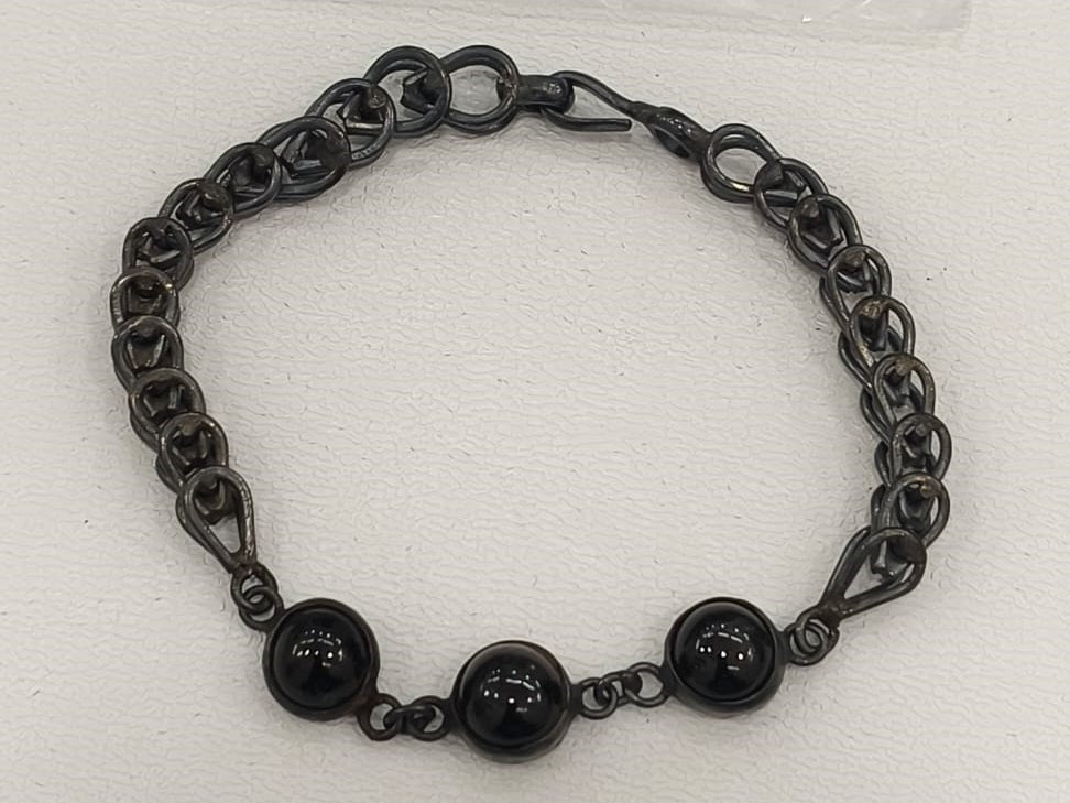 16.10/GM BLACK STAR SILVER  BRACELET  (525.00)