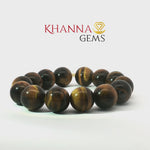 Load and play video in Gallery viewer, Natural Tiger Eye Bracelet (Round Beads)