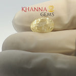 Load and play video in Gallery viewer, 5.57/CT Natural Yellow Sapphire With Govt Lab Certificate (16650)