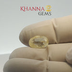 Load and play video in Gallery viewer, 6.40/CT Natural Yellow Sapphire With Govt Lab Certificate (34410)