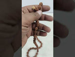 Load and play video in Gallery viewer, THREE MUKHI RUDRAKSHA MALA - KG01